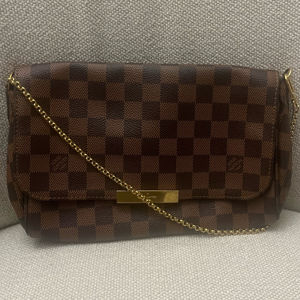 Félicie leather clutch bag
